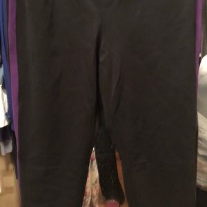 Torrid black pants w/ purple stripe down sides
